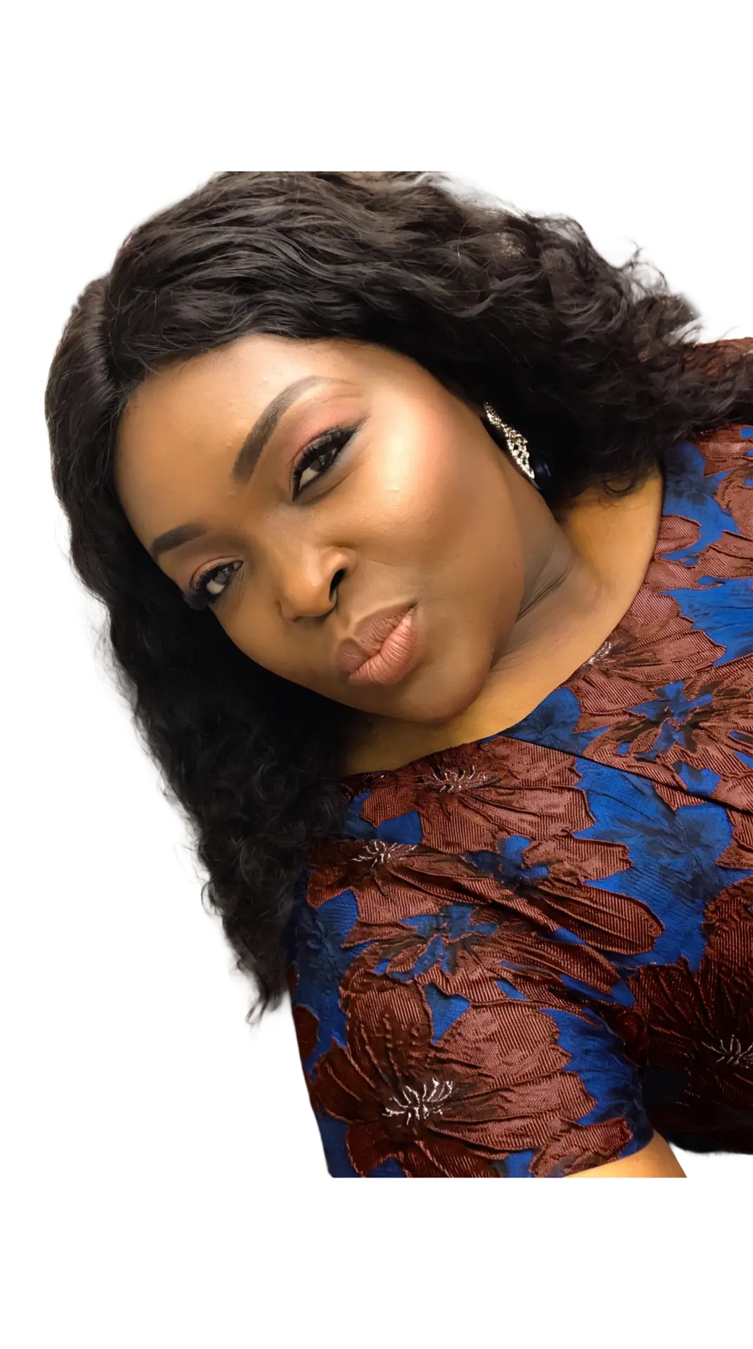 Toun Fadugba in a blue and luxury-brown floral dress